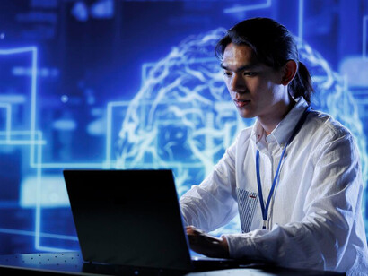 A technician performing AI simulations that delve into the realms of artificial intelligence, philosophy, and technology, while examining human-machine interaction and the transformative role of AI in both education and medicine