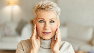 An energetic older woman with glowing skin, capturing the goal of increasing vitality rather than chasing immortality