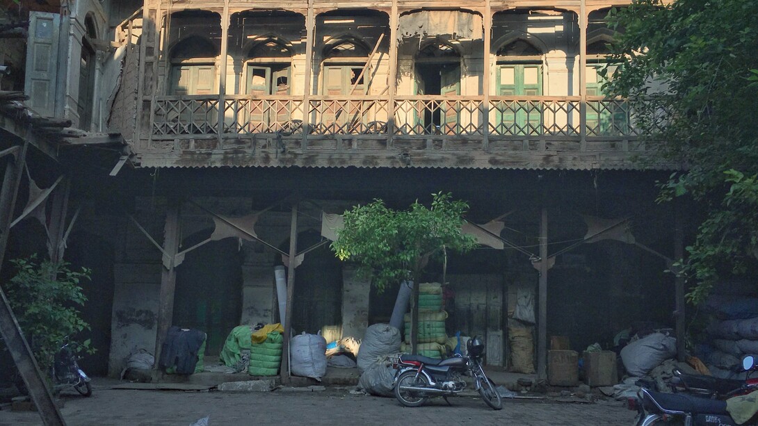 A motorbike outside a building in Qissa Khwani Bazaar, Peshawar, Pakistan