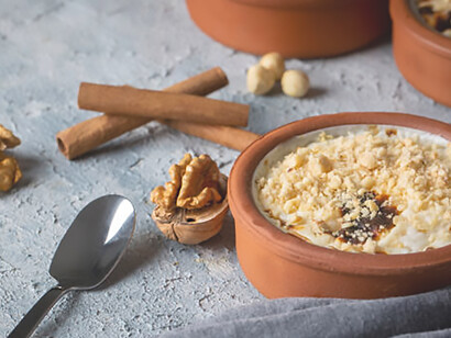 Let the delicate sweetness of the milky pudding dance on your palate, complemented by the nutty crunch of hazelnuts
