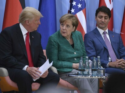Donald Trump and Angela Merkel at the Conference on Climate Change