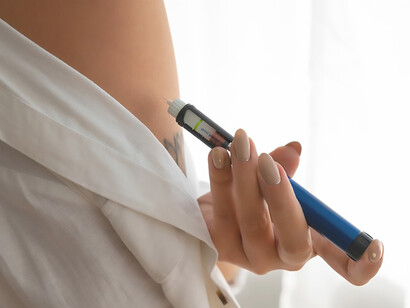 Side view diabetic woman checking her glucose level