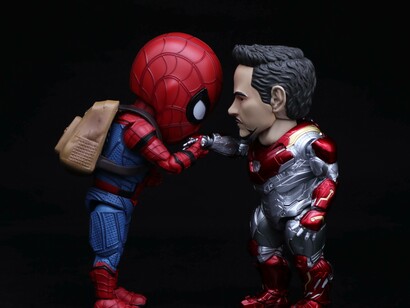 Children and adults purchase superhero collectibles like these Spiderman and Iron Man ones