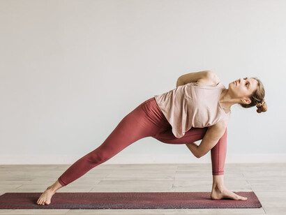 In Utthita Parshvakonasana, or extended side angle pose, she embodies strength and grace, illustrating the beauty of balance in both body and mind