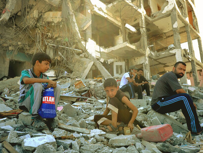 Together in the rubble, they represent the hope for a brighter future, urging the world to confront the realities of violence and commit to lasting peace