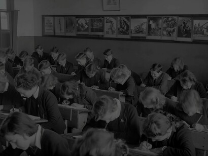 A depiction of classrooms in UK schools in the 1960s