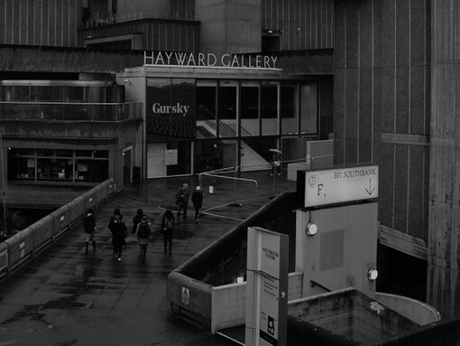 The imposing concrete façade of The Hayward Gallery, an art gallery within the Southbank Centre in central London, England, reflects the bold, geometric style of Brutalist architecture, inviting viewers to explore its unique artistic vision