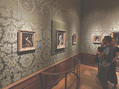 The captivating allure of Johannes Vermeer's "Girl with a Pearl Earring" (1632-1675) at the Mauritshuis museum in Den Haag, Netherlands, where Room 15 hosts this iconic masterpiece, offering a mesmerizing journey into Dutch Golden Age artistry