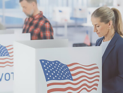 Diverse people queueing before voting booths to give their vote to a preferred candidate