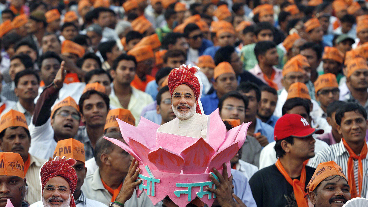 Supporters of Narendra Modi, the Prime ministerial candidate for Bharatiya Janata Party