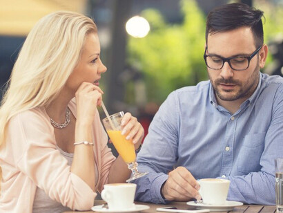 The dynamic of love and connection as a couple enjoys coffee together, embodying empowerment and meeting relationship expectations
