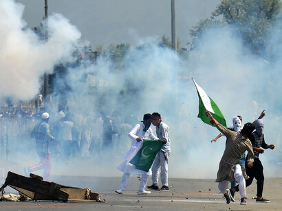 Kashmiri protesters clash with Indian police as they took to the streets chanting pro-freedom