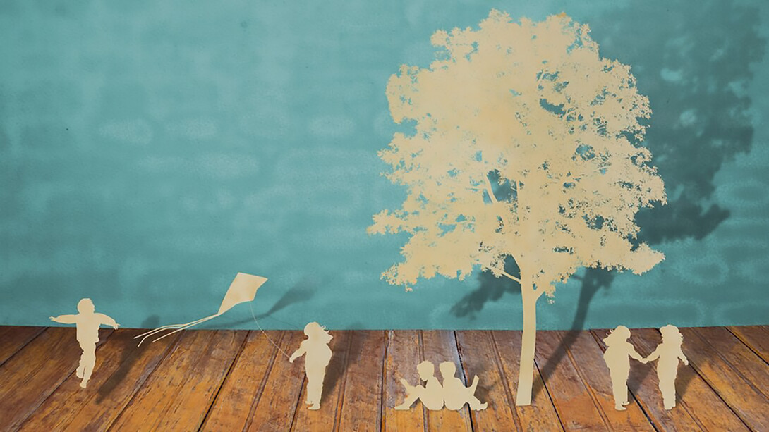Silhouettes of trees and people on a wood