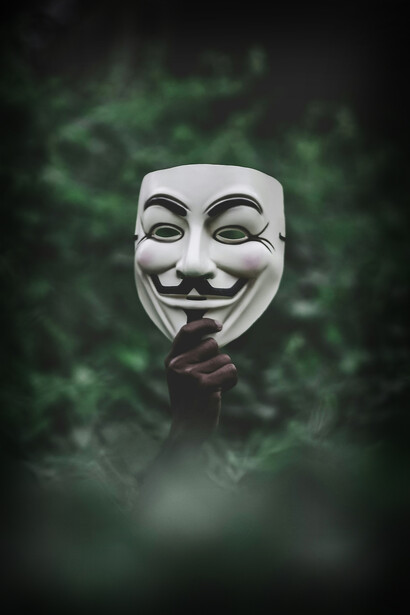 A masked face hiding the true self
