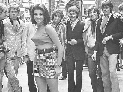 1960s, street fashion, woman wearing a miniskirt