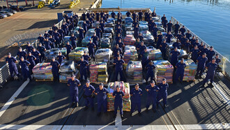 The crew of the U.S. Coast Guard Cutter Bertholf offloads more than 25 tons of seized cocaine in San Diego on November 19, 2015. The narcotics were confiscated during 26 separate interdictions carried out by the U.S. Coast Guard in coordination with international partners in the Eastern Pacific Ocean, US