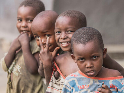 In the heart of South African townships, children play under the bright sun, symbolising the dawn of democracy they were born into in 1994, a beacon of hope for future generations