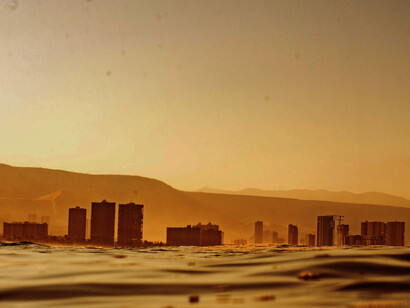 A view of a coastal city, polluted
