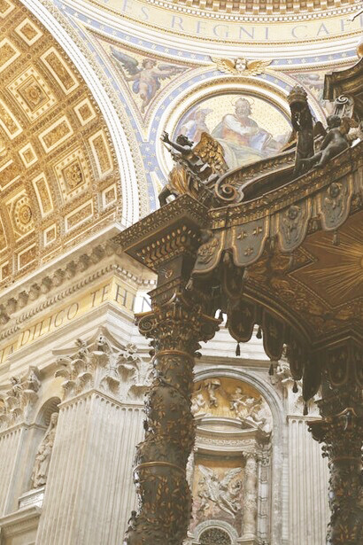 Under the majestic dome of St. Peter's Basilica in Rome stands a remarkable replica of Bernini's iconic baldachin