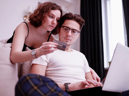 Excitedly preparing to complete their purchase, they embrace the convenience of modern commerce where virtually anything is available at their fingertips