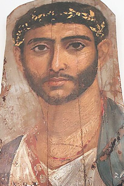 The compelling mummy portrait of a youthful soldier displayed at the Altes Museum in Berlin, offering insight into ancient Egyptian funerary practices and artistic expression