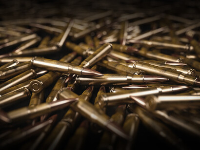 In a Quantum suicide experiment with the gun, when the person pulls the trigger, there are two possible outcomes: the gun either fires or it doesn't