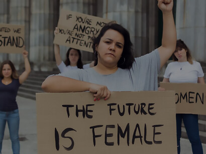 Feminist solidarity in action: women unite under a 'future is female' banner, showcasing dedication to activism and the pursuit of gender justice