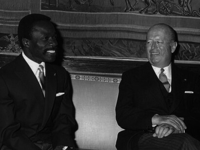 President Albert-Bernard Bongo of Gabon travels to France from 6 to 10 July 1970. Arriving at the Élysée Palace, he was welcomed by Jacques Foccart, Élysée General Secretary for African Affairs, on 6 July 1970