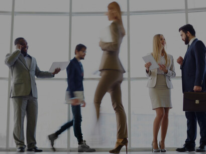 Executives in sharp attire, actively engaged in the bustling rhythm of professional life and career growth