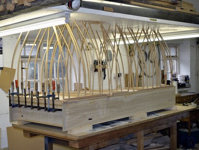 Gluing on the bottom board with go bars