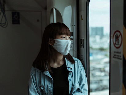 The woman's mind takes flight, soaring through memories of past travels and dreams of adventures yet to come, each passing landscape outside her window whispers promises of new horizons and boundless possibilities