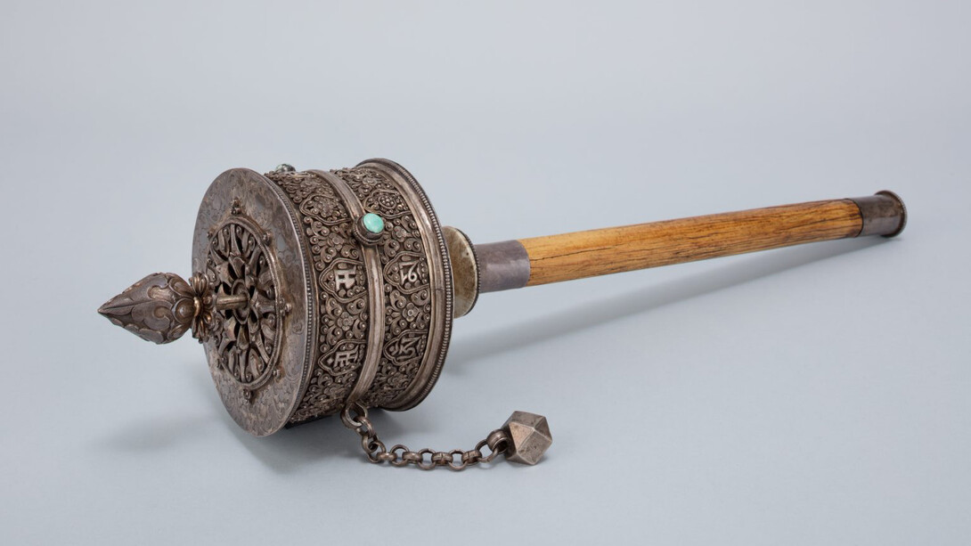 Handheld prayer wheel, Central Tibet, early 20th century. Courtesy of the Rubin Museum of Art