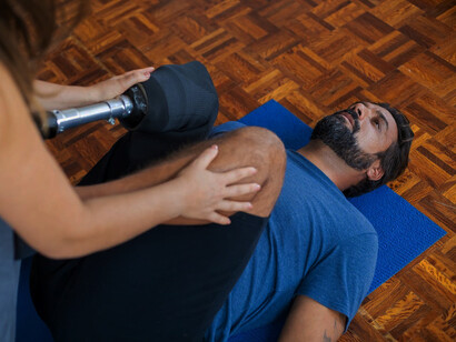 A man navigates his rehabilitation journey, embracing the transformative potential of Pilates, embodying the resilience and determination that have made this new form of exercise a cornerstone of modern fitness