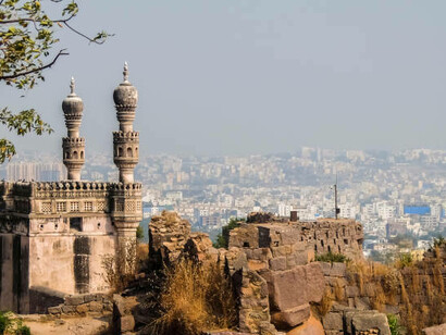 A panoramic view of Hyderabad's cityscape from the historic walls of Golconda Fort in India