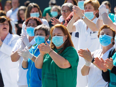Health professionals rallying for medical justice, advocating for equitable healthcare policies, Spain
