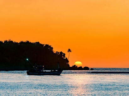 Captivating close-up of a sunset in Goa, India, highlighting the vibrant colors
