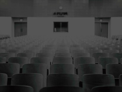 The dusty auditorium from lack of use in UK schools