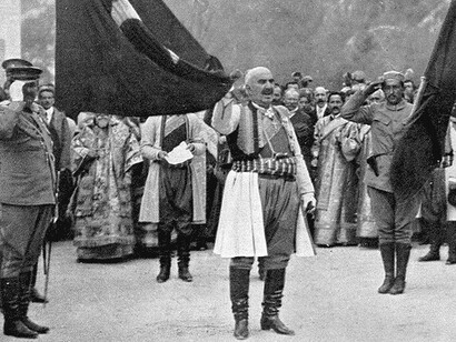 King Nicholas of Montenegro with captured Ottoman flag