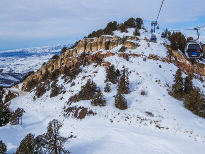 Chimgan, Uzbekistan, where you can enjoy skiing, hiking, and the serene atmosphere of the Tien Shan mountains