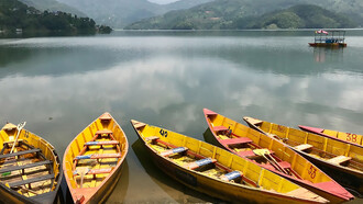 Begnas Lake, located in Lekhnath, Kaski District, Nepal, is a tranquil freshwater lake surrounded by rural villages and scenic Himalayan foothill