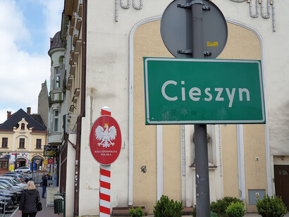 Close up of town sign and Polish coat of arms, Cieszyn, Poland
