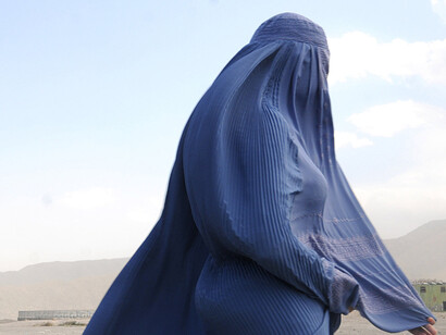 Woman with a blue burka