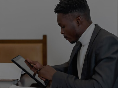 A businessman works at his desk