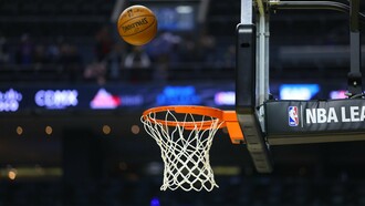 With the NBA logo visible, this image sets the stage for the predicted competitive spirit and thrilling moments that fans will be watching for in the 2025 NBA Playoffs