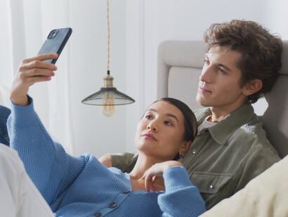 Even in a happy moment, the constant pull of social media reminds us of its addictive nature and the challenge of maintaining balance in our digital lives