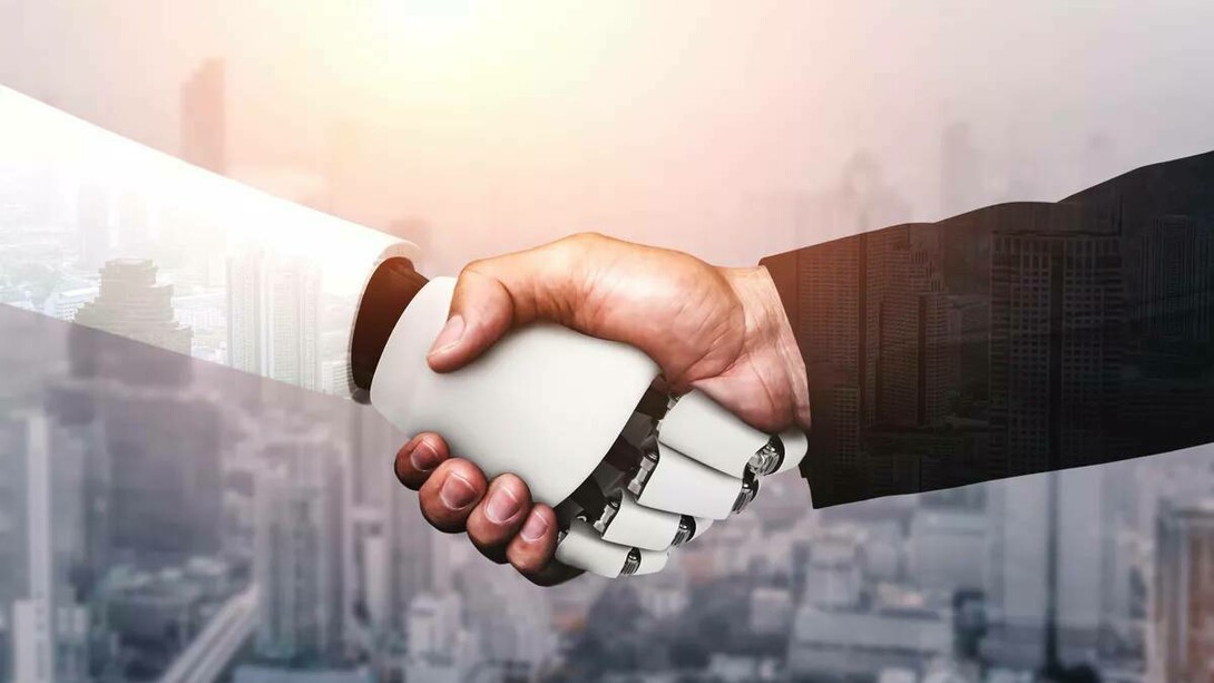 An agreement via a handshake between a businessman and an AI