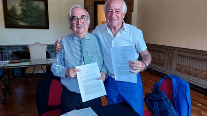 Francisco Rojas Aravena, Rector of the United Nations University for Peace, and Salvatore Grasso, author of the Anthem of the United Nations University for Peace, at the signing