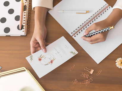 Mastering wedding planning and budget control: A top-down view of a woman meticulously managing every detail for the perfect celebration