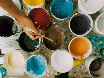 An assortment of different buckets of paint; "formalism" refers to an aesthetic philosophy that deals with the purpose or ideal function of artworks