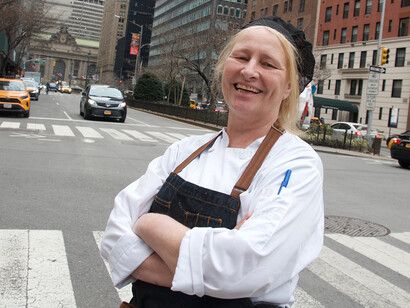 A smile draws on Bengtsson's face as she poses on the street crossing. Photo by Maria Mellin